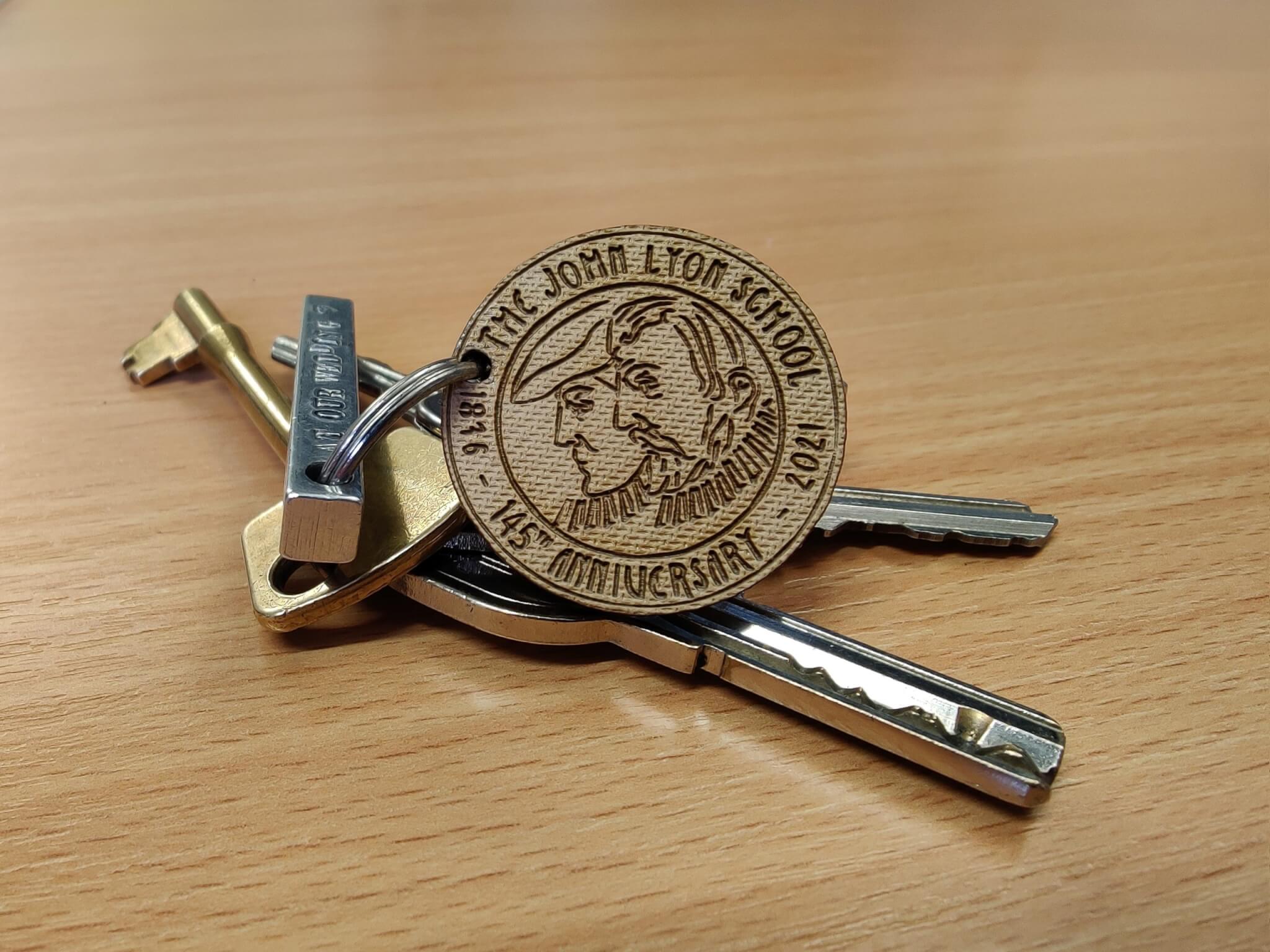 An anniversary keyring for John Lyon's 145th anniversary